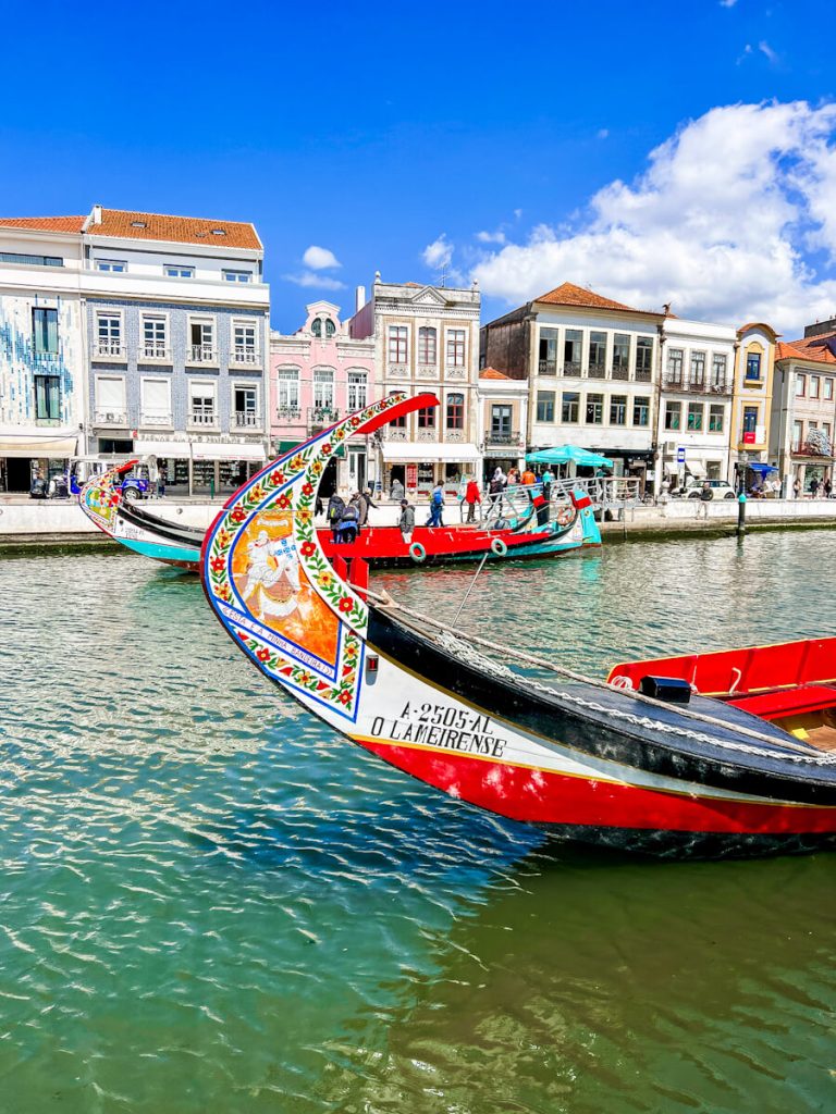 Colorful boat (barcos moliceiros) on canal in Aveiro, Portugal