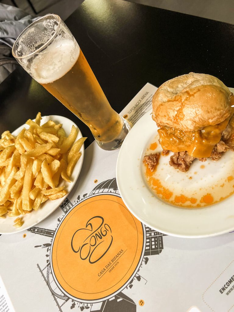 Bifana (Portuguese pork sandwich), fries and a pint of beer