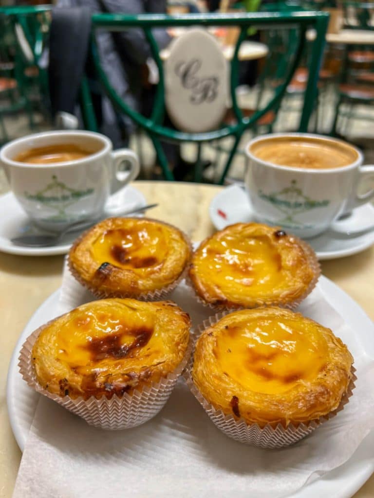 Plate of 4 pasties de natal and 2 coffees at Confeitaria do Bolhao